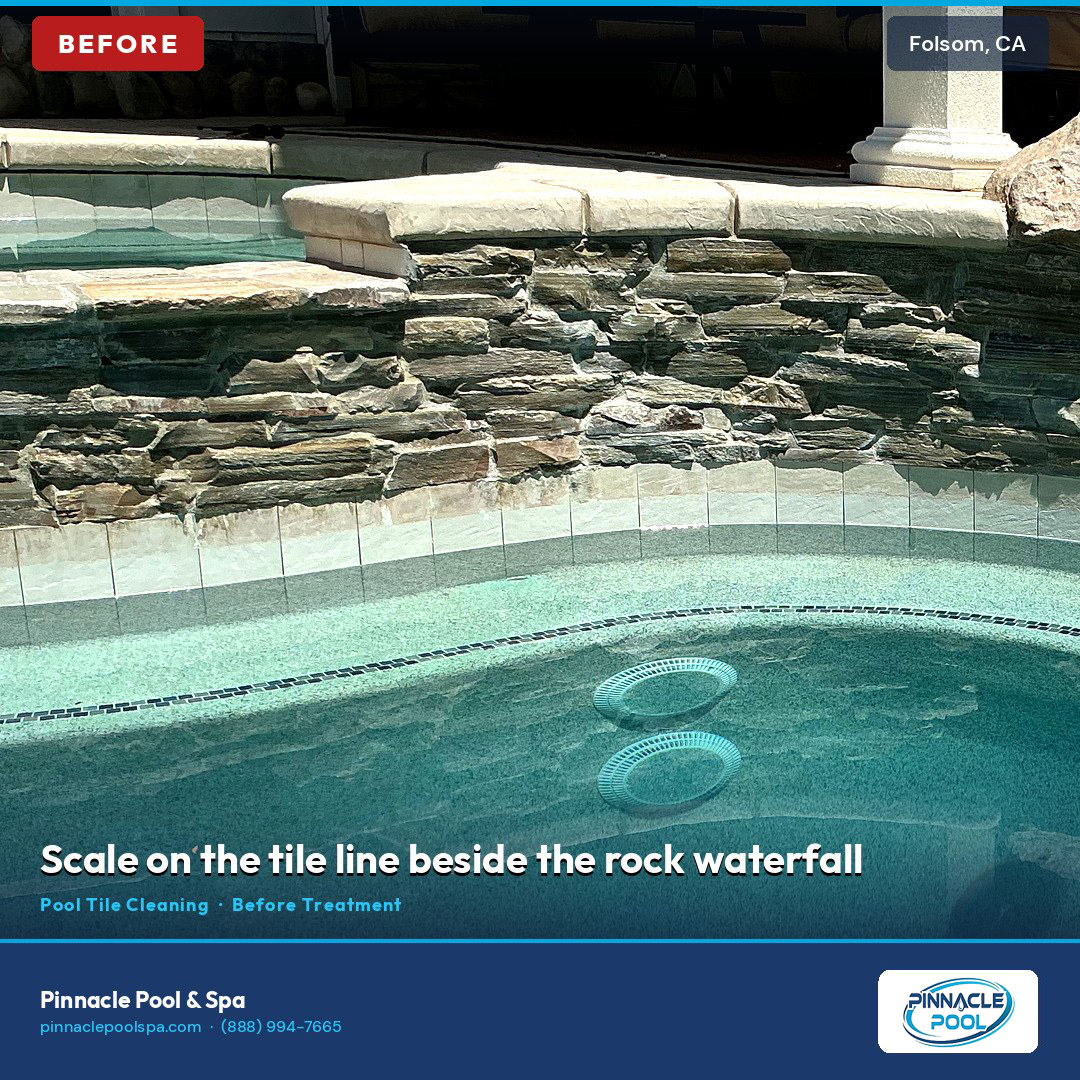 Before — scale on the tile line beside the rock waterfall, Folsom CA