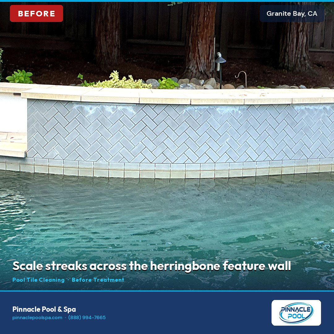 Before — scale streaks across the herringbone feature wall, Granite Bay CA